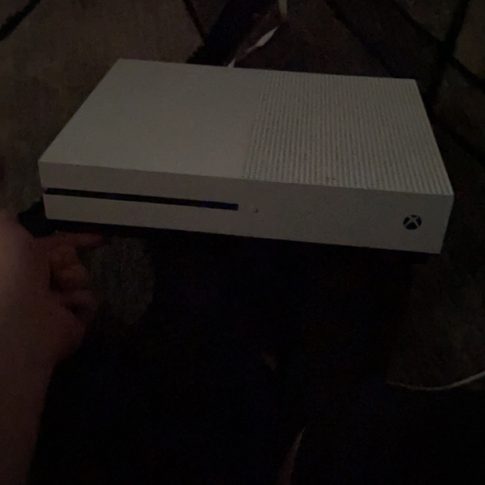 Xbox 1 with a lot of games on it that I bought with 2 controller
